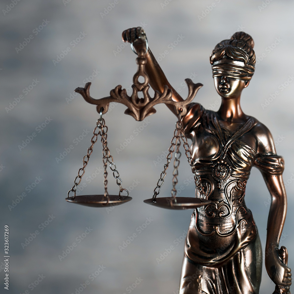 Law and Justice concept. Mallet of the judge, books, scales of justice. Gray stone background, reflections on the floor, place for typography. Courtroom theme.. Wooden rustic background Law and Justice concept. Mallet of the judge, books, scales of justice. Gray stone background, reflections on the floor, place for typography. Courtroom theme.. Wooden rustic background