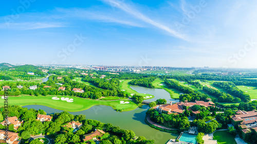 Aerial view of a beautiful green golf course in Shanghai panoramic view.