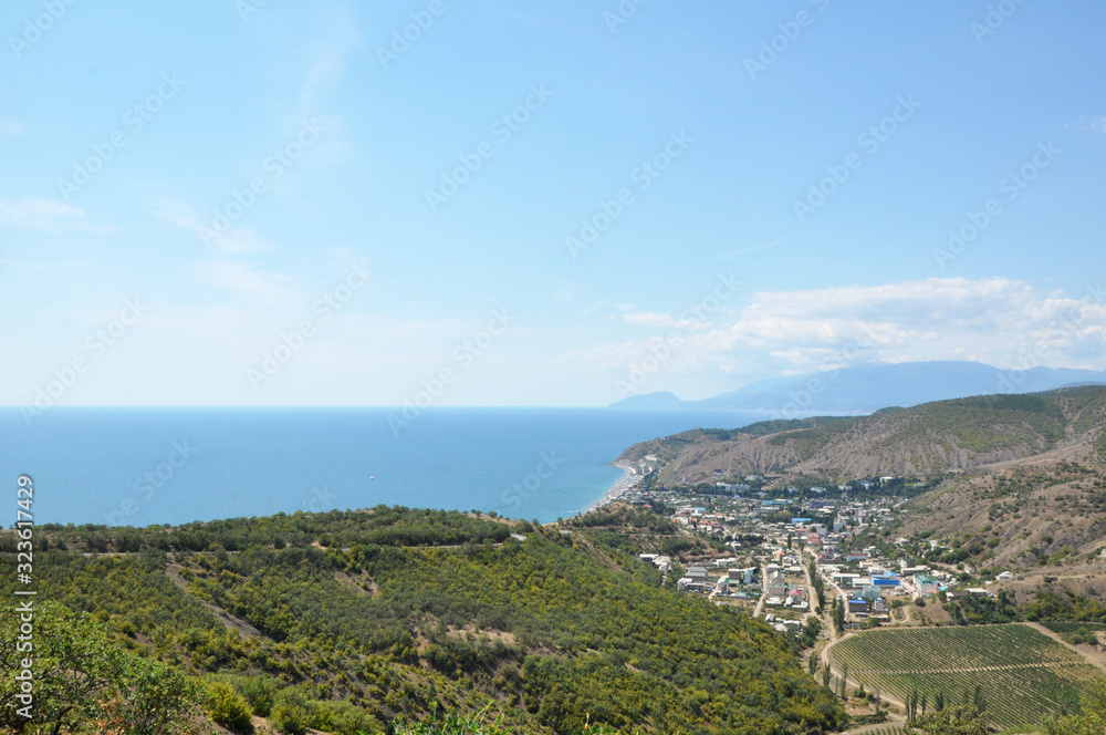 Beautiful view of the sea and mountains from the shore. Crimea