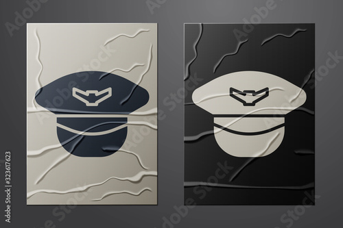 White Pilot hat icon isolated on crumpled paper background. Paper art style. Vector Illustration