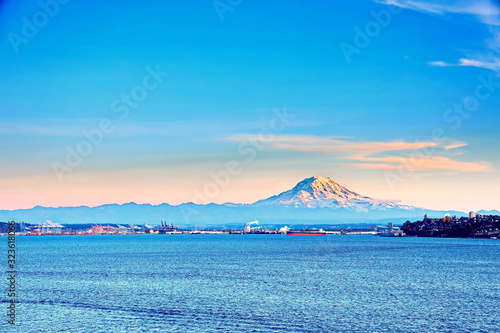 Mount Rainier over Tacoma, Washington, USA.Views of the volcano from the side of Commensement Bay. October, 2019. photo