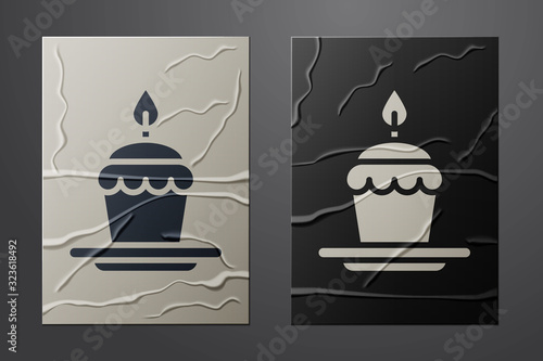 White Cake with burning candles icon isolated on crumpled paper background. Happy Birthday. Paper art style. Vector Illustration