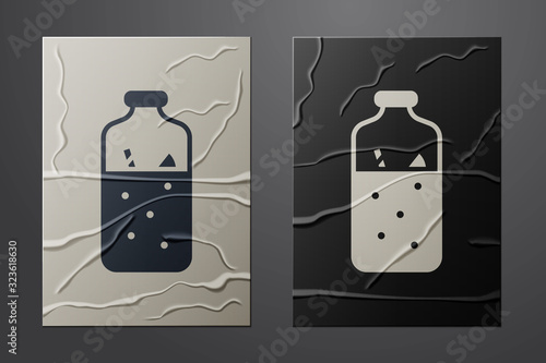 White Mulled wine with ingredients icon isolated on crumpled paper background. Cinnamon stick, clove, lemon slice. Paper art style. Vector Illustration