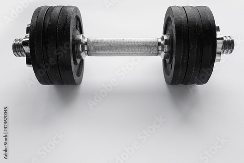 Iron dumbbell on white background, fitness