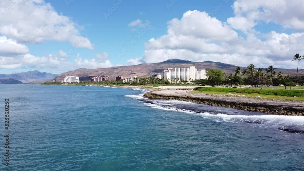 Beautiful day in Oahu, Hawaii with large hotels in the background. Beautiful day in Oahu, Hawaii with large hotels in the background.
