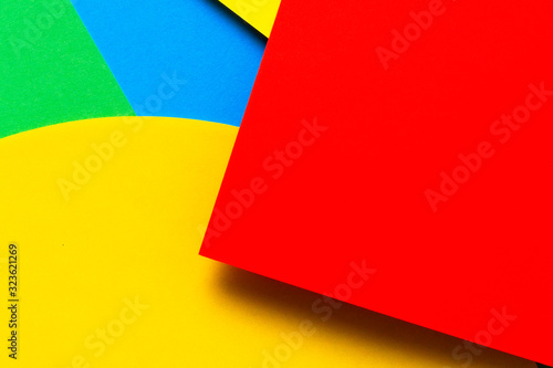 Abstract colored paper texture background. Minimal geometric shapes and lines in yellow, light blue, red, green colors