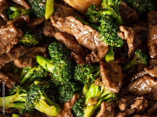 Beef with broccoli vegetables roasted, close up. selective focus. Flat top view, overhead.