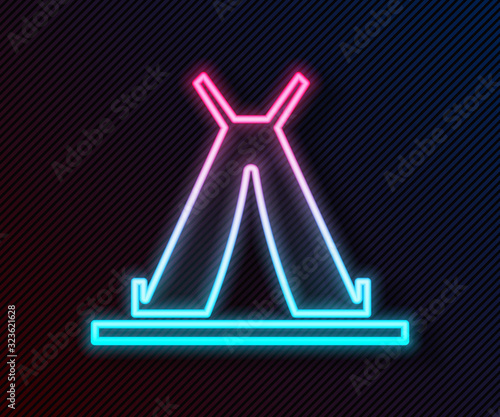 Glowing neon line Traditional indian teepee or wigwam icon isolated on black background. Indian tent. Vector Illustration
