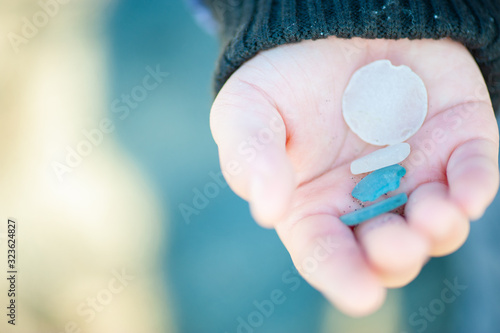 Sea Glass, Sand Dollar and Hand
