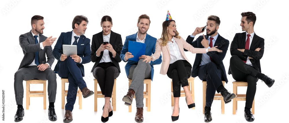 Team of 7 happy businessmen celebrating a coworker birthday