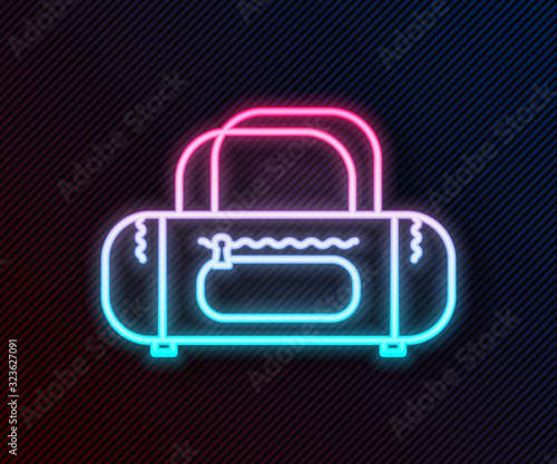 Glowing neon line Sport bag icon isolated on black background. Vector Illustration