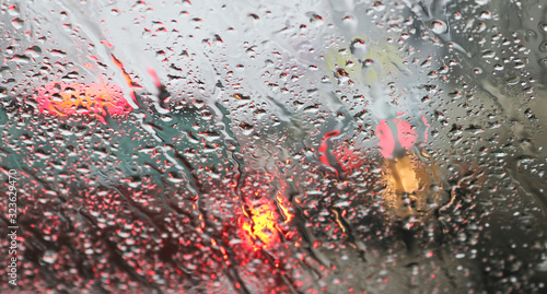 Obraz na płótnie View from the car windscreen during rain and wet snow