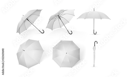 collection of white umbrellas isolated on a white background  mock up