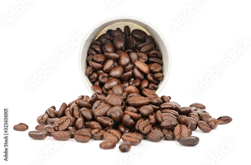 Coffee beans scattering from a paper cup