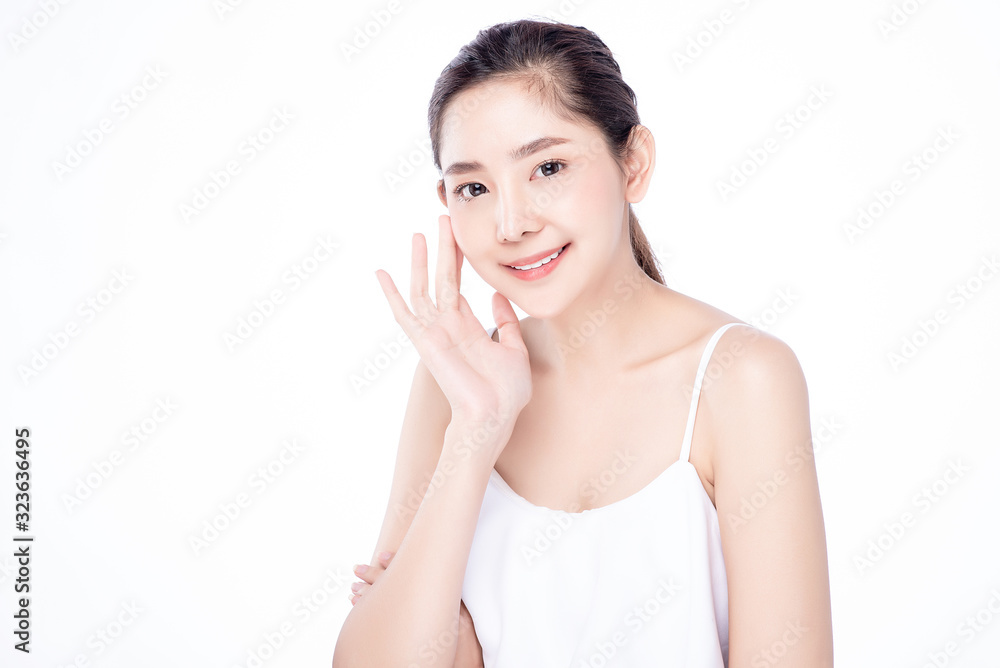 Asian woman poses for healthy skin beauty in white isolated background. Cosmetic, skincare, surgery concept with copy space. Asian woman poses for healthy skin beauty in white isolated background. Cosmetic, skincare, surgery concept with copy space.