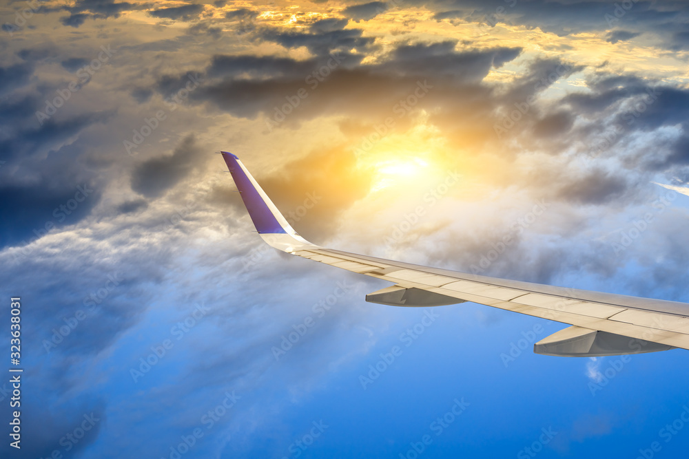 High-altitude airplane and beautiful sky at dusk High-altitude airplane and beautiful sky at dusk