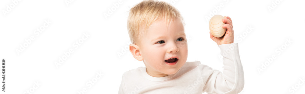 Cute child holding egg with open mouth on white background, panoramic shot Cute child holding egg with open mouth on white background, panoramic shot