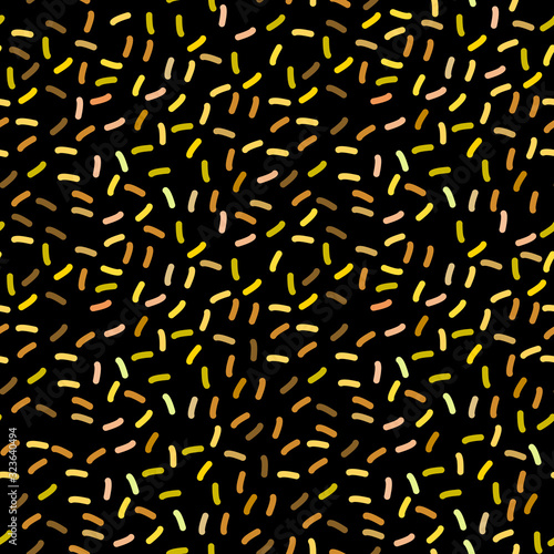 seamless pattern with confetti, sprinkles festive glitter. Brown yellow gold orange beige on black background. Can be used for greeting card design, Gift wrap, fabrics, wallpapers. Vector