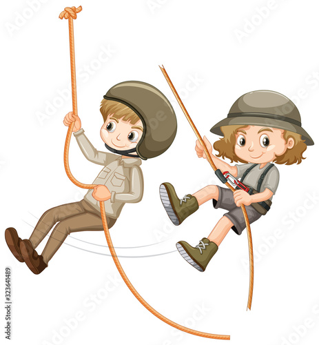 Boy and girl in scout uniform climbing rope