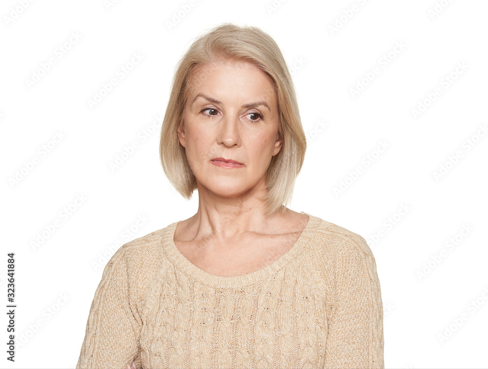 Portrait of a thoughtful middle aged retired woman Portrait of a thoughtful middle aged retired woman