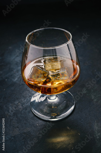 Whiskey with ice in a classic glass