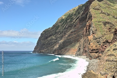 Panoramic view of the cliffs on Atlantic Ocean's bay (Madeira, Portugal, Europe)