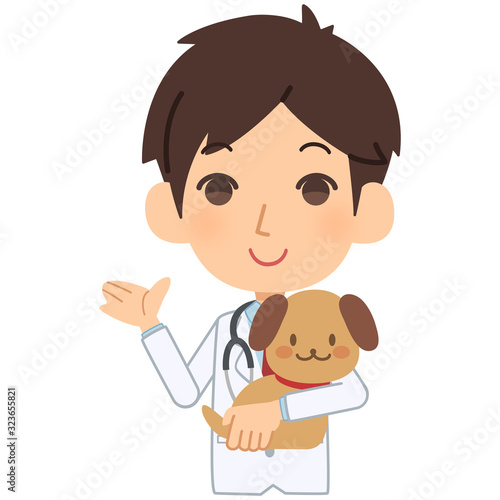 説明をする獣医と犬