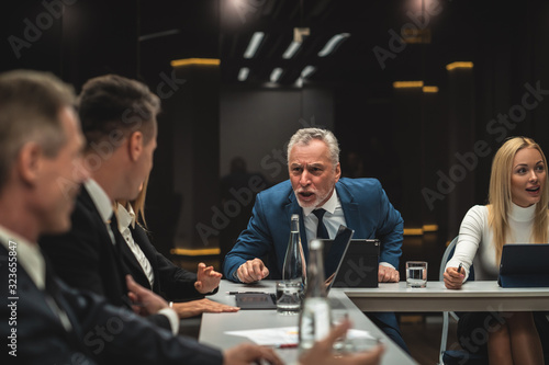 The people talking to each other on business conference