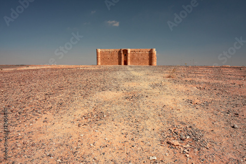 View of the archaeological ruins of the Qasr al-Kharana castle in Jordan. photo