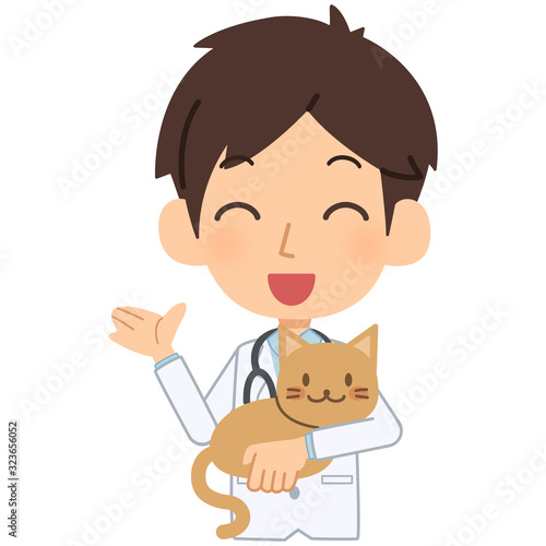 説明をする笑顔の獣医と猫