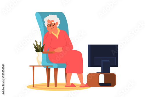 Elderly people and couple sitting on the sofa or armchair and watching TV
