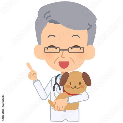 説明をする笑顔の獣医と犬