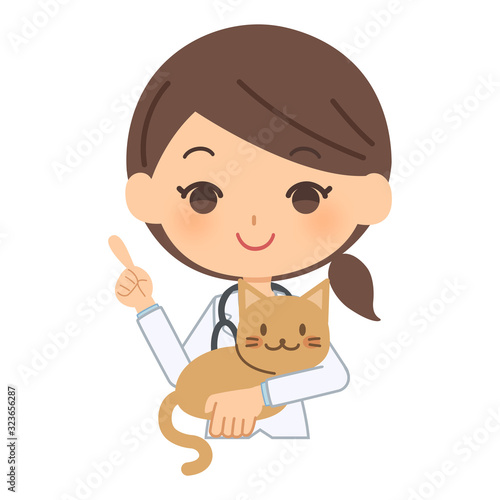 説明をする獣医と猫