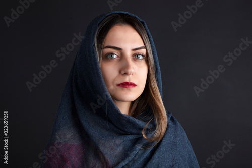 portrait of blue eyed middle eastern woman