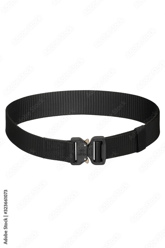 Subject shot of a black canvas belt fitted with a black metal male buckle and a black belt loop. The webbing belt is isolated on the white background. Subject shot of a black canvas belt fitted with a black metal male buckle and a black belt loop. The webbing belt is isolated on the white background.