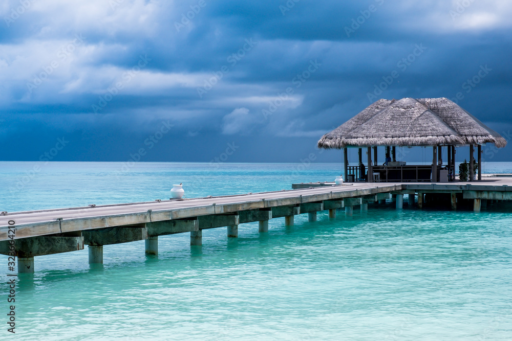 wooden pier in a resort in maldives