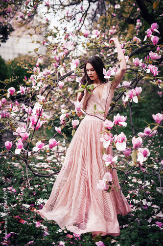 portrait of a woman in magnolia flowers