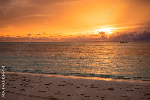 sunset in a beach in maldives