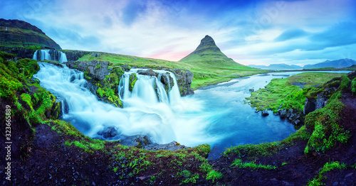 Gorgeous landscape with Kirkjufellsfoss waterfall and Kirkjufell mountain, Iceland, Europe.