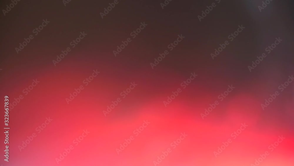 Background made of red film movement of light Background made of red film movement of light