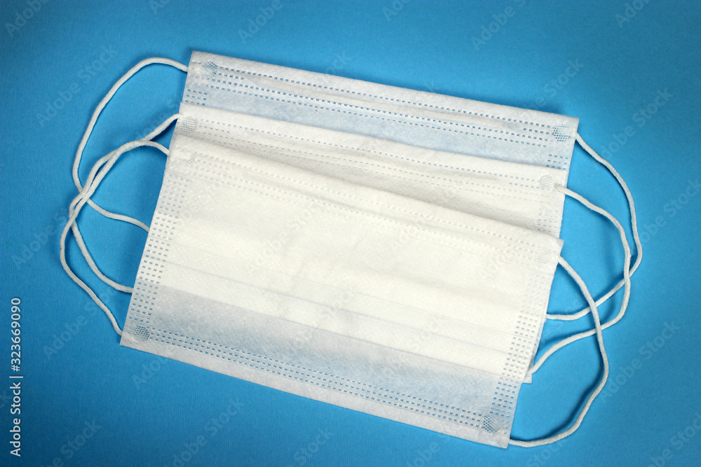 Surgical medical protective mask cover the mouth and nose. Procedure mask from bacteria. Protection concept. Surgical medical protective mask cover the mouth and nose. Procedure mask from bacteria. Protection concept.