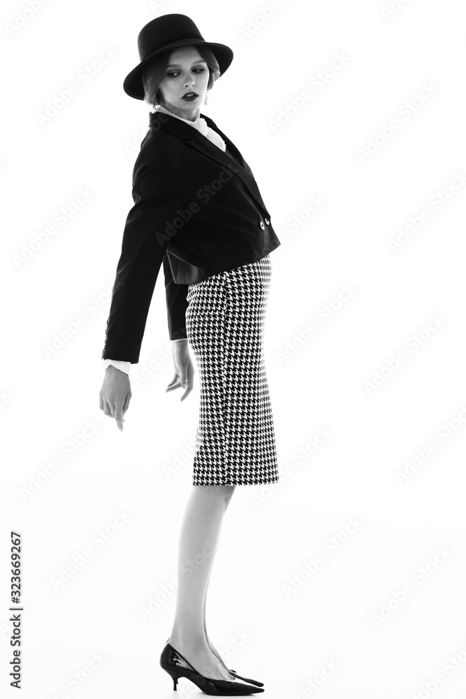 High fashion portrait of elegant woman in retro look. High fashion portrait of elegant woman in retro look.