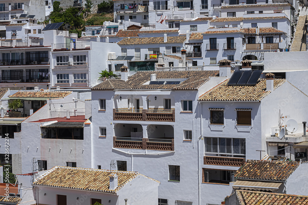 Fototapeta premium Beautiful aerial view of Mijas - Spanish hill town overlooking the Costa del Sol, not far from Malaga. Mijas known for its white-washed buildings. Mijas, Andalusia, Spain.