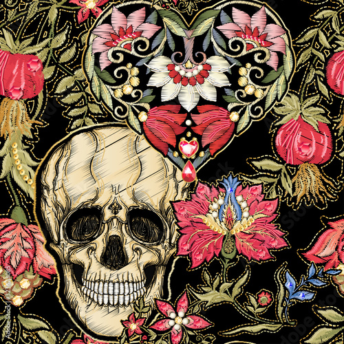 Seamless pattern, background with patch, embroidery imitation. Decorative floral motif with human skull in retro, vintage, jacobean embroidery style. Vector illustration isolated on black.
