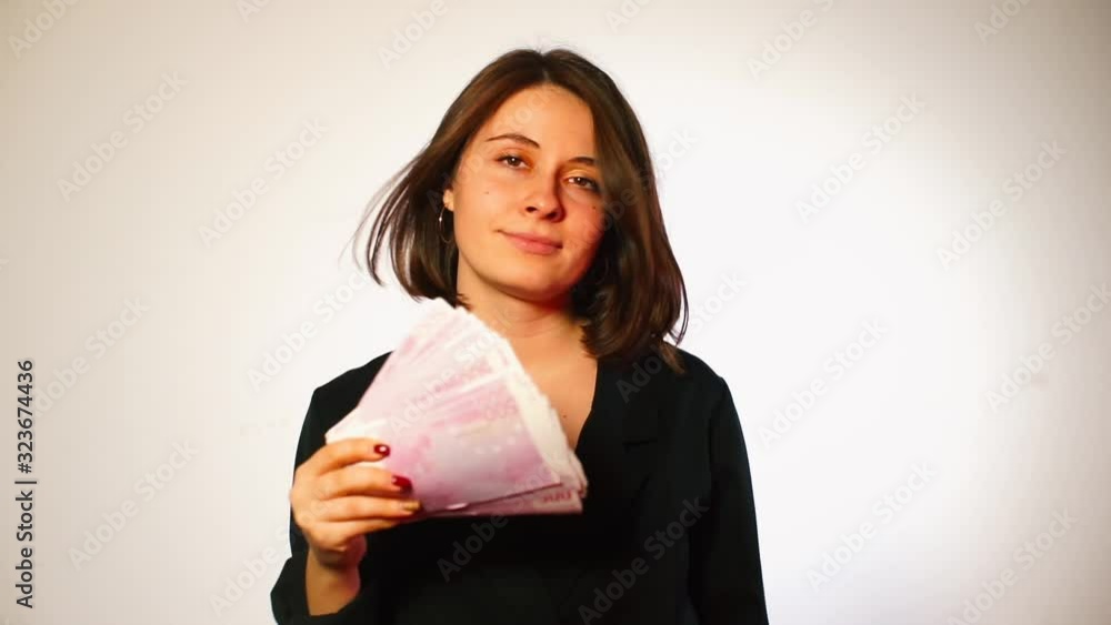 A businesswoman holds in his hands banknotes of 500 euros. A businesswoman holds in his hands banknotes of 500 euros.