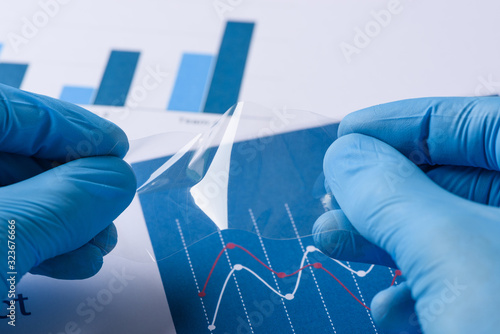 Canvas Print Scientist show layer of novel transparent flexible thin film research in laborat