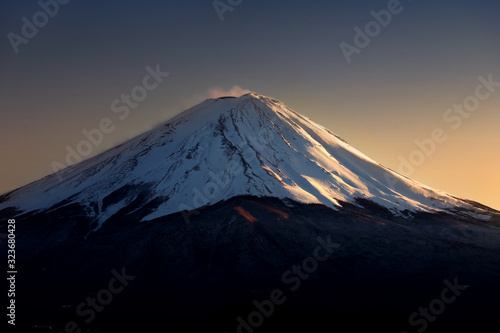close-up top of Mountain Fuji with snow in the evening. © worawut