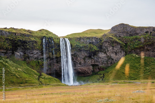 Seljalandsfoss Waterfall in Iceland. It is located near ring road of South Iceland. Majestic and picturesque  it is one of the most photographed breathtaking place of Iceland