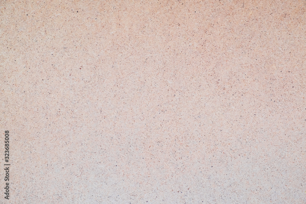 Fototapeta premium Plywood texture background, or sheet of wooded fragments of compressed sawdust.