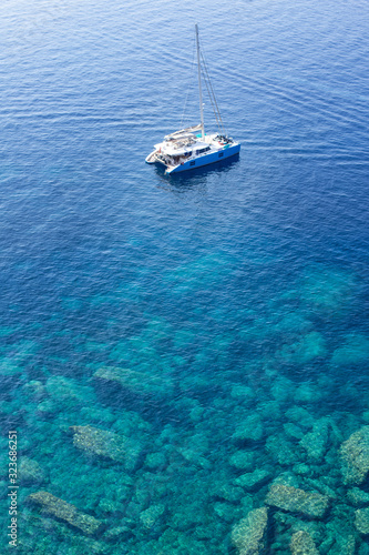 Aerial view of a transparent turquoise sea at Corsica France. © studio GDB